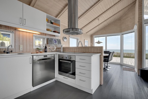 Fridge, stovetop, dishwasher, coffee/tea maker