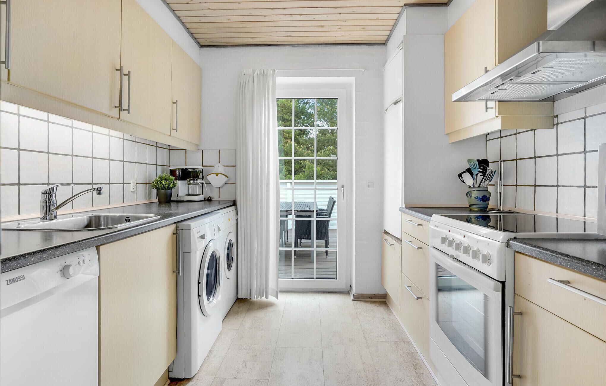 Fridge, stovetop, dishwasher, coffee/tea maker