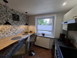 Fridge, microwave, oven, high chair