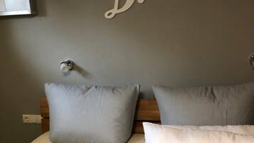 Down comforters, blackout drapes, free WiFi, bed sheets