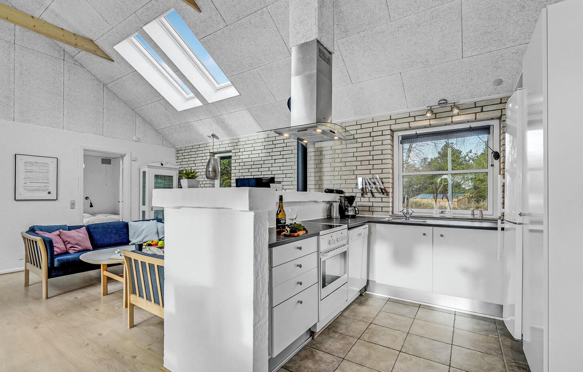 Fridge, stovetop, dishwasher, coffee/tea maker