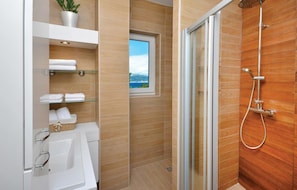 Combined shower/tub