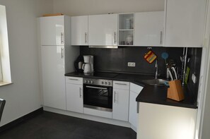 Fridge, oven, dishwasher - Vacation home Claire - Holiday home Claire-2 bedrooms up to max. 4 pers. and 1 baby (Karlshagen)