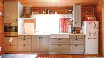 Fridge, stovetop, coffee/tea maker, cookware/dishes/utensils