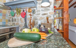 Fridge, stovetop, dishwasher, coffee/tea maker