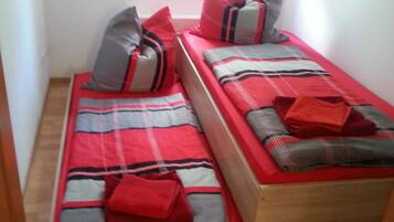 2 bedrooms, travel crib, WiFi, bed sheets