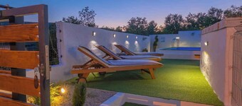 Holiday home with children's playground and sauna