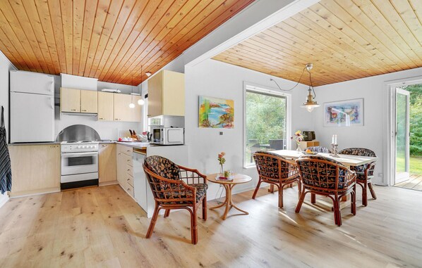 Fridge, stovetop, dishwasher, coffee/tea maker