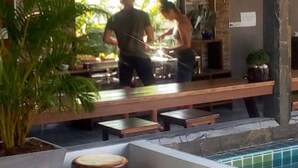 A bar area with a pool table, seating, and a view of the outdoors. - Baan Chankaew Hotel (Ko Pha-ngan)