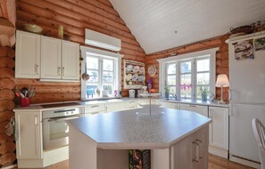 Fridge, stovetop, dishwasher, coffee/tea maker