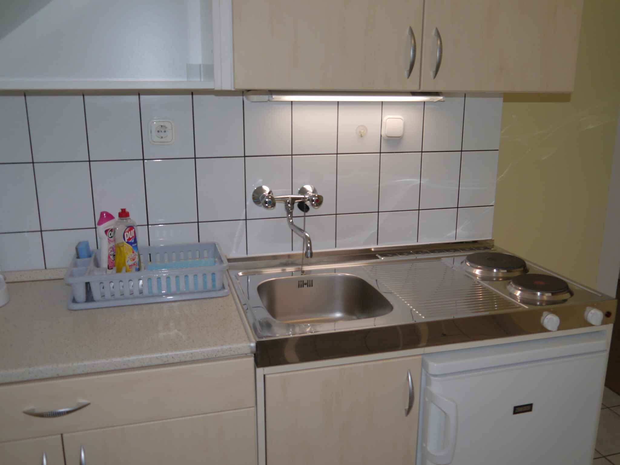 Fridge, microwave, stovetop, coffee/tea maker
