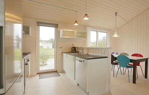 Fridge, stovetop, dishwasher, coffee/tea maker