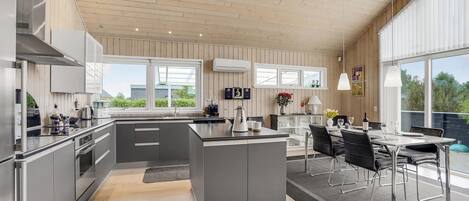 Fridge, stovetop, dishwasher, coffee/tea maker