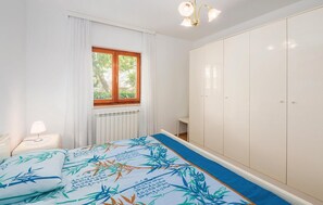 2 quartos, berço de viagem, Wi-Fi de cortesia, roupa de cama