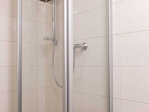 Regadera y secadora de cabello 