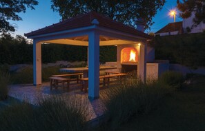A covered outdoor patio with a brick oven and seating area. - Amazing home in Bisko with private swimming pool, can be inside or outside (Bisko)