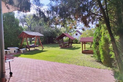 Holiday home with garden and barbecue