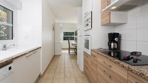 Coffee/tea maker, fridge, microwave, dishwasher