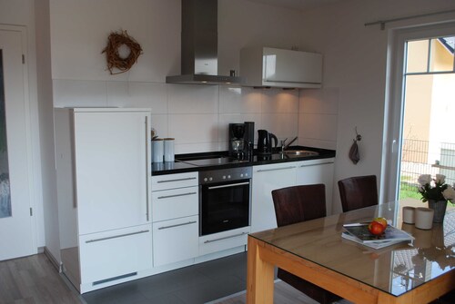 Cliffside accommodation, WLAN, terrace, washing machine