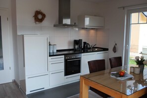 Fridge, oven, dishwasher, high chair