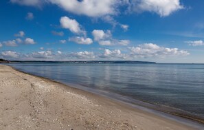 On the beach, fishing