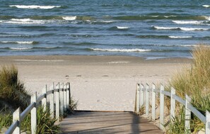 On the beach, fishing