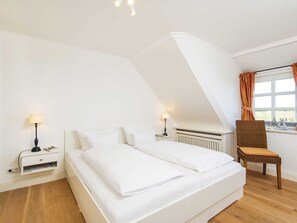 4 habitaciones, tabla de planchar con plancha, cuna de viaje y wifi