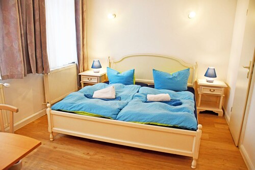 03 Chambre à plusieurs lits (2 pièces) - Villa dans la station balnéaire de Baabe