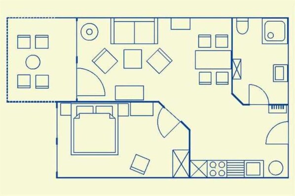 Un plan d’étage comprenant plusieurs pièces, un espace cuisine et une salle de bain.