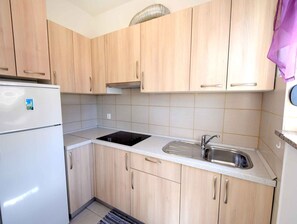 Refrigerador, placa de cocina