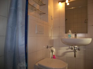 Hair dryer, towels, soap, toilet paper