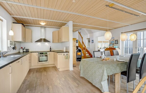 Fridge, stovetop, dishwasher, coffee/tea maker