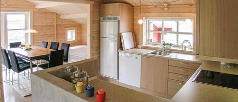 Fridge, stovetop, dishwasher, coffee/tea maker