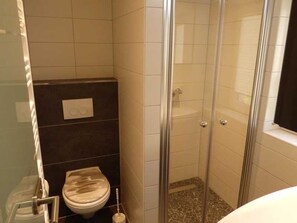 Regadera y secadora de cabello 