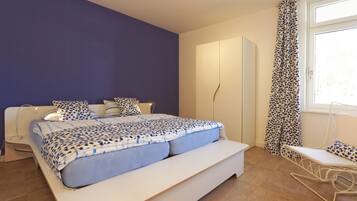 2 bedrooms, in-room safe, iron/ironing board, travel crib