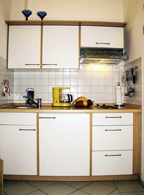 Fridge, coffee/tea maker, electric kettle, toaster