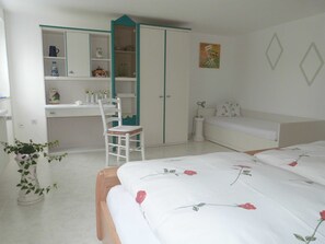 1 bedroom, desk, travel cot, bed sheets