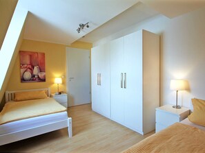 2 quartos, berço de viagem, Wi-Fi, roupa de cama