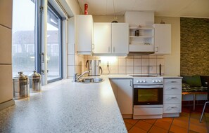Fridge, stovetop, coffee/tea maker, cookware/dishes/utensils