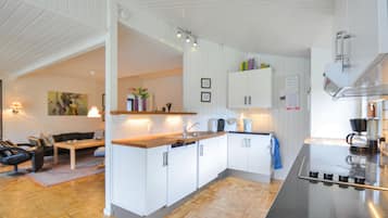 Fridge, stovetop, dishwasher, coffee/tea maker