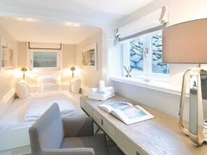 2 habitaciones, tabla de planchar con plancha, cuna de viaje y wifi