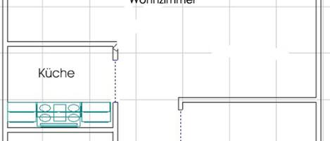 A floor plan with a living room, kitchen, bathroom, and bedroom.