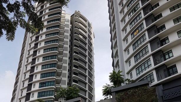 A modern high-rise building with multiple balconies and a covered entrance area. - MZ Homestay Kuala Lumpur (Kuala Lumpur)