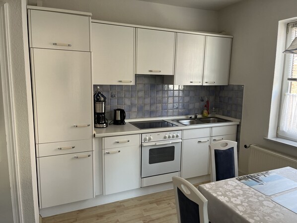 Fridge, oven, high chair