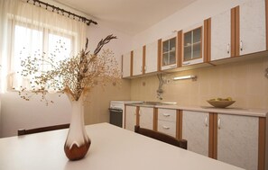 Fridge, stovetop, coffee/tea maker