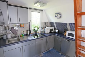 Fridge, microwave, dishwasher, coffee/tea maker