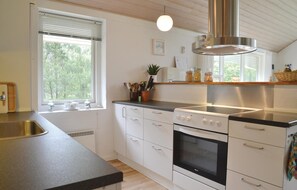 Fridge, stovetop, dishwasher, coffee/tea maker