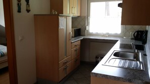 Refrigerador, microondas, horno y lavavajillas 