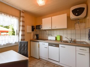 Fridge, microwave, high chair
