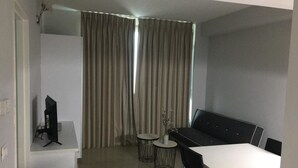 Classic Suite, 1 Bedroom, City View | Living area | Flat-screen TV - Carmel Apartments (Netanya)